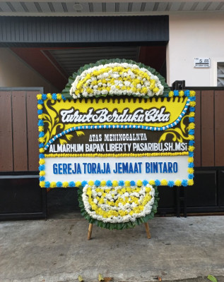 Papan Bunga Duka di Dorpedu